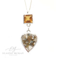 Jewelry set with a square-cut citrine gemstone and heart-shaped rutilated quartz pendant on a white background, branded 'Elaine McKay Jewellery'.