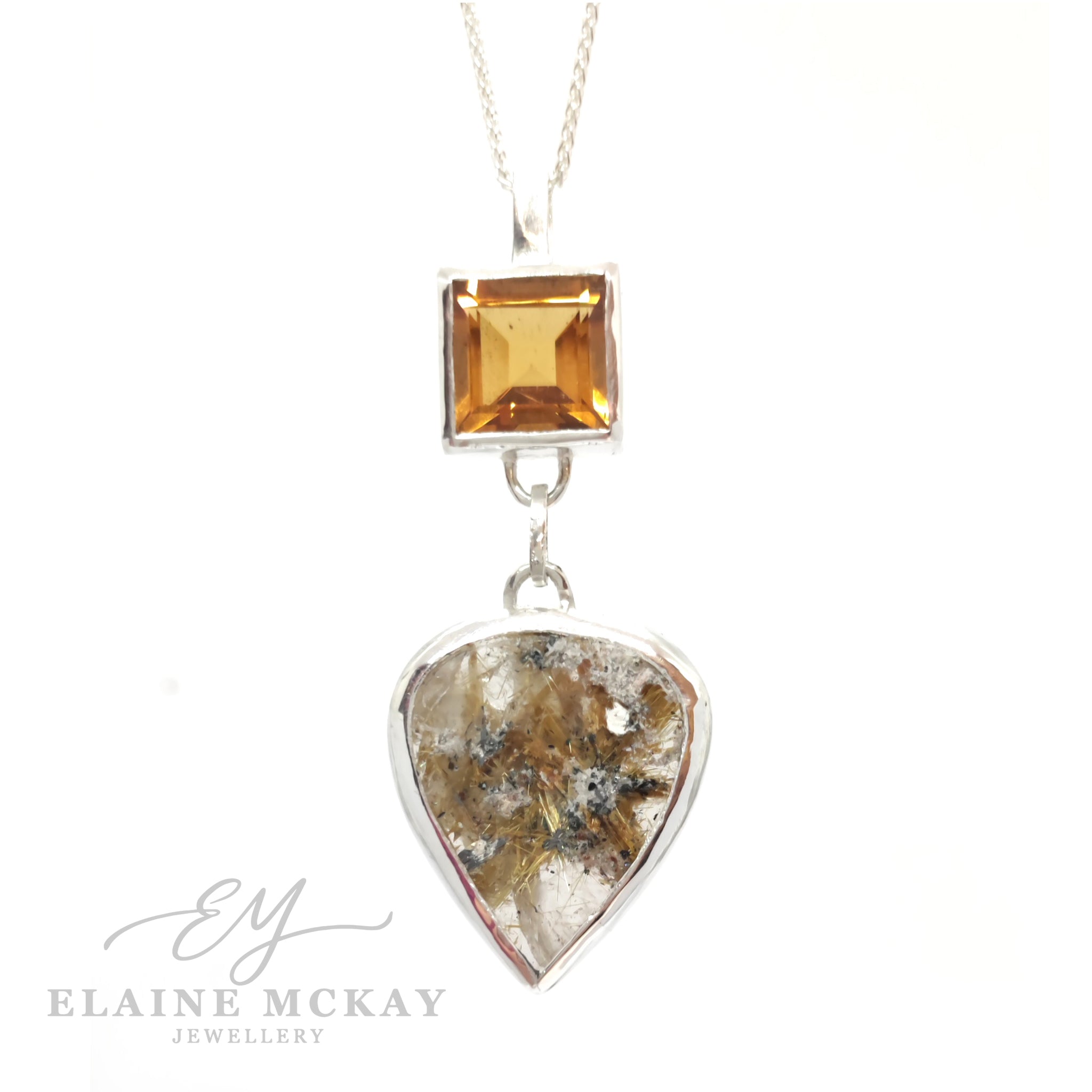 Jewelry set with a square-cut citrine gemstone and heart-shaped rutilated quartz pendant on a white background, branded 'Elaine McKay Jewellery'.