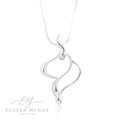 Silver necklace with a wavy pendant on a white background, branded 'Elaine McKay Jewellery'.